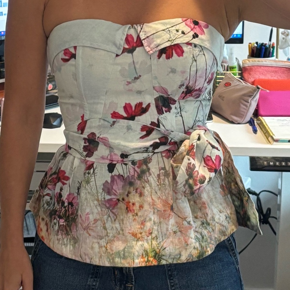 Cream Sleeveless Peplum Blouse with Pink Floral Design